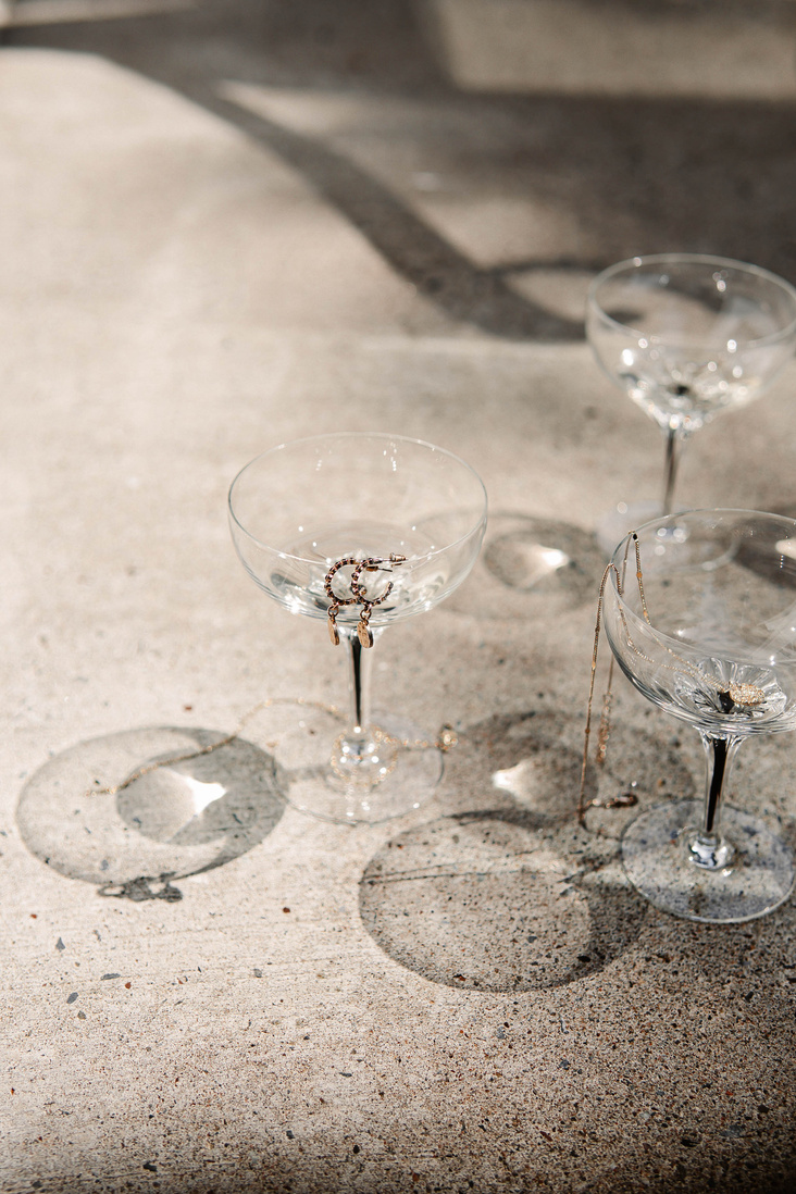 Clear Wine Glass on White Sand